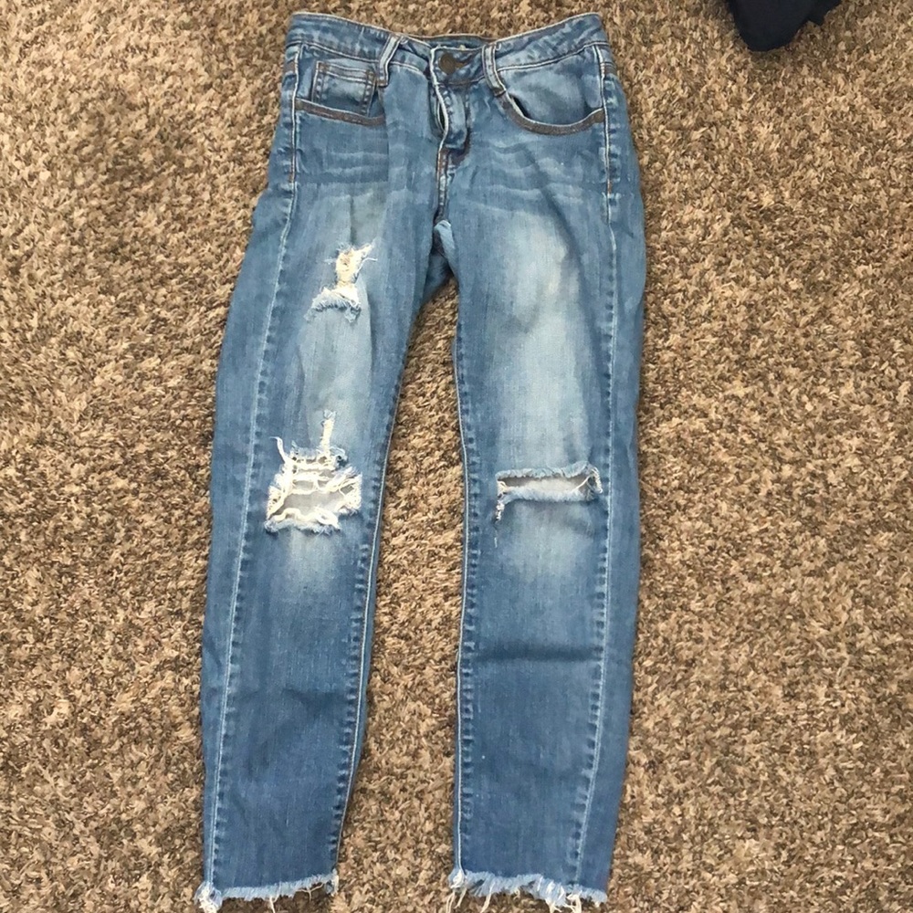 A small ripped jeans